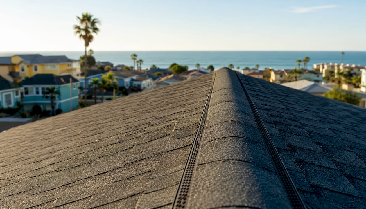 Continuous ridge vent on gable roof peak