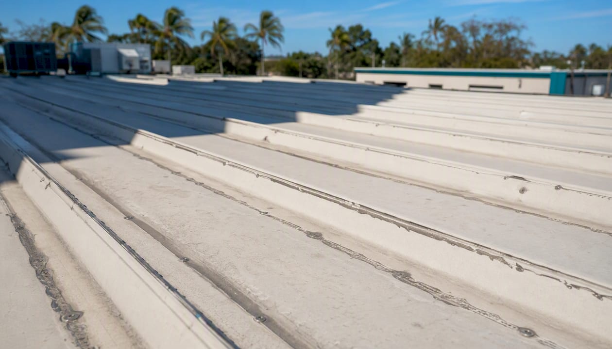 Aged commercial metal roof panels close-up