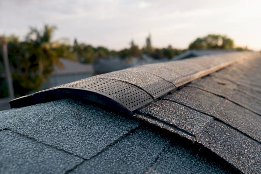 Continuous ridge vent detail on asphalt shingle roof