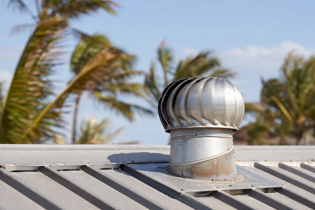 Spinning turbine roof vent on residential roof