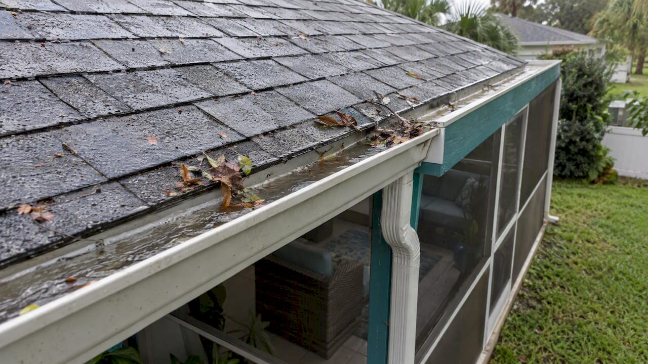 Coastal Roofing & Construction LLC | Tampa Roof Maintenance: 3 Storm Season Checks and When to Call a Roofer Tampa home roof and gutter after rain